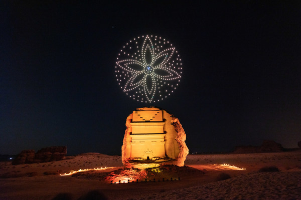 Sculptures of light draw the skies above the ancient UNESCO World heritage Site of Hegra in AlUla, the Majestic Desert City in Northwest Arabia