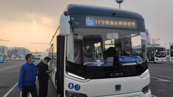 Sunwin Series 9 green buses shuttle visitors to and from CIIE