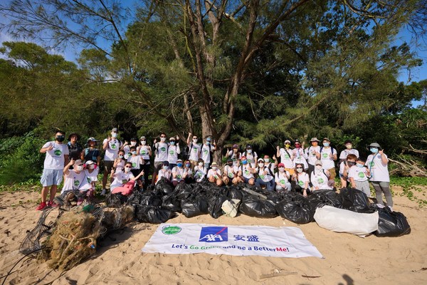 AXA management and employees conducted beach clean-up